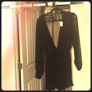 Shear open black romper never worn
